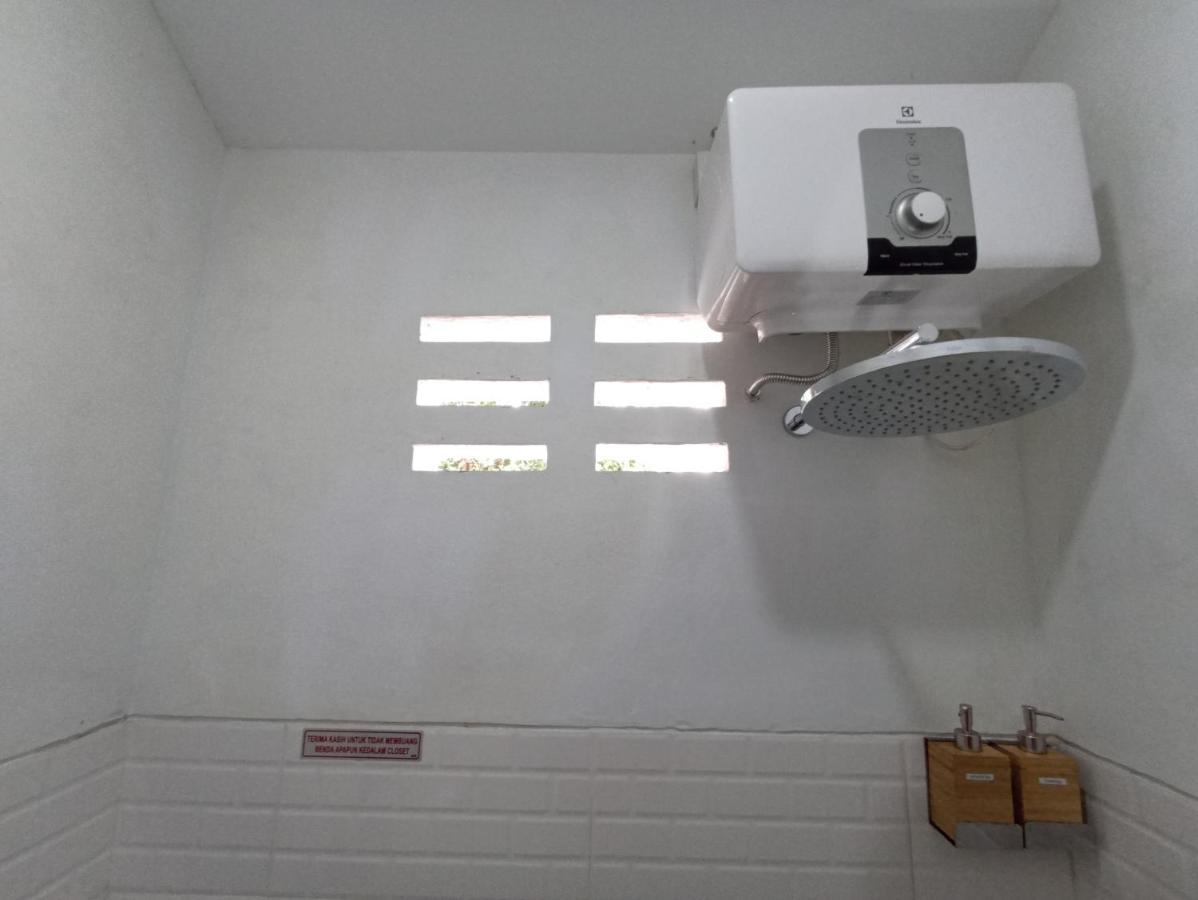 Mruyung Guest House Kota Lama Banyumas Mitra Reddoorz Экстерьер фото